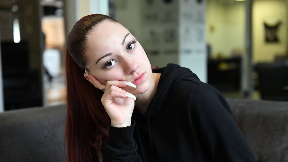 Bhad Bhabie with hand resting on face