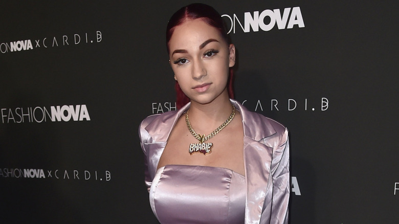 Danielle Bregoli in front of Fashion Nova wall