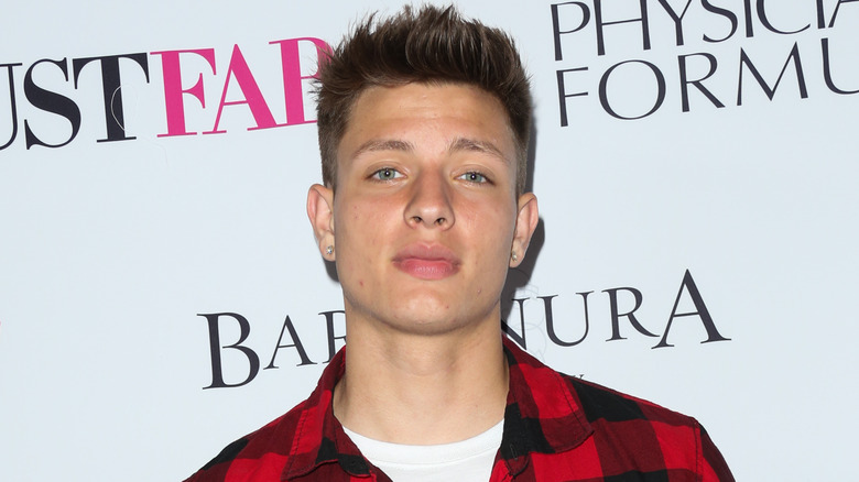 Matt Rife wearing plaid shirt