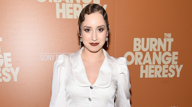 Jazmin Grace Grimaldi smiling at the screening of "The Burnt Orange Heresy"