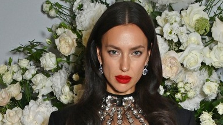 Irina Shayk in bra and denim jacket