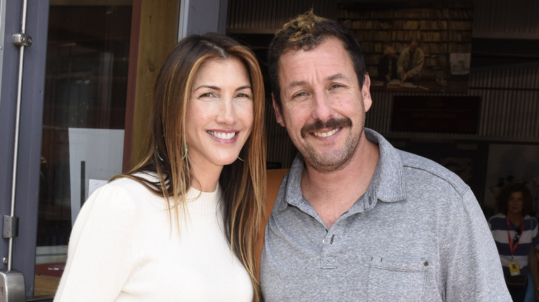 Jackie and Adam Sandler smiling