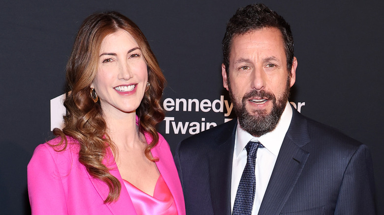 Jackie and Adam Sandler posing