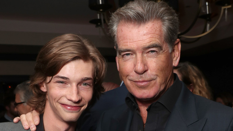 Jacob Lofland posing with co-star Pierce Brosnan