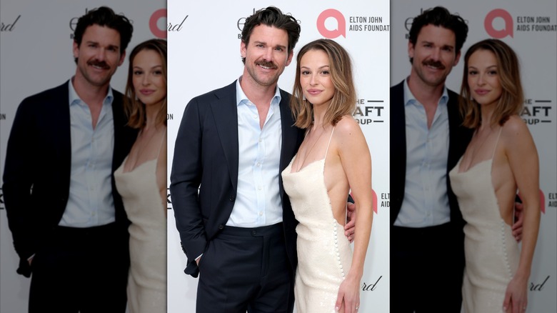 Kayla Wallace posing with Kevin McGarry on the red carpet.