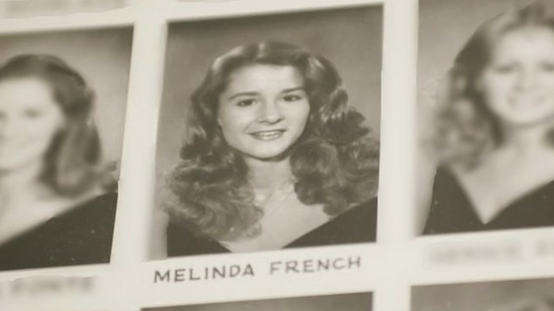 Melinda Gates, sporting wavy hair, smiles in her high school yearbook.