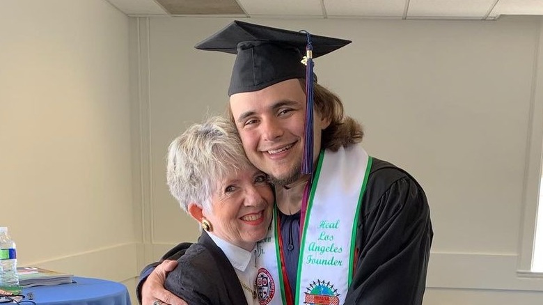 Prince Jackson posing with an unidentified woman