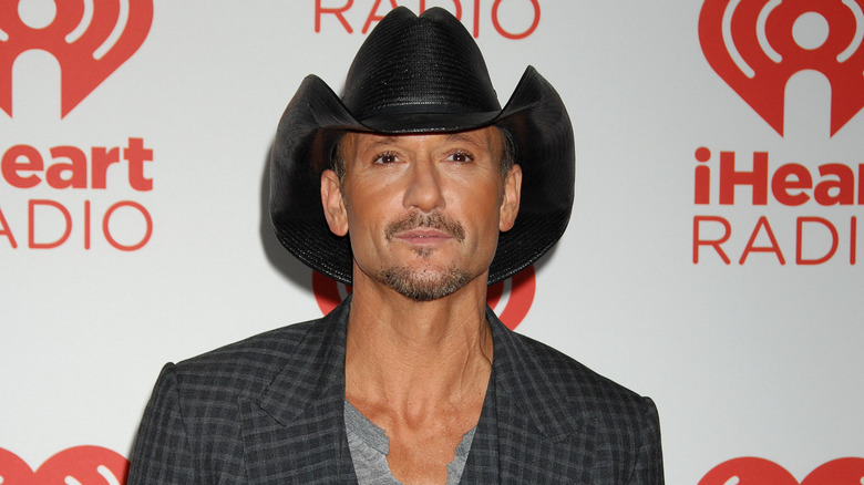 Tim McGraw wearing a black cowboy hat