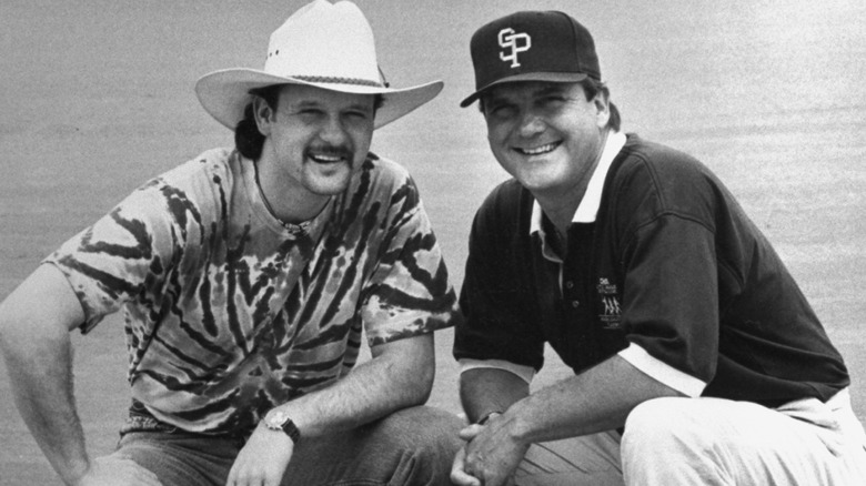 Tim McGraw posing with father Tug McGraw