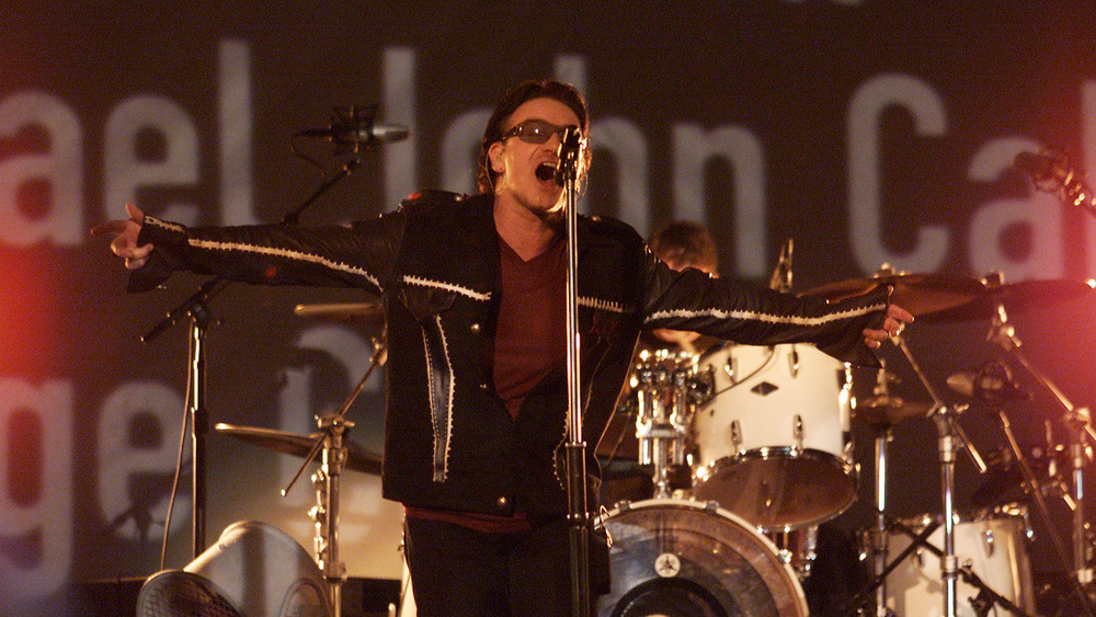 Bono performing with U2 during the Super Bowl XXXVI halftime show