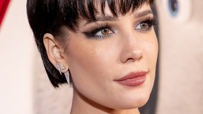 Halsey wearing earrings