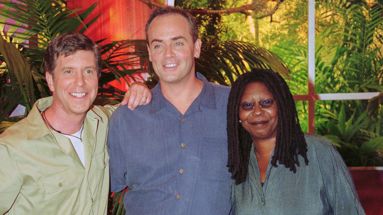 Richard Hatch posing with people