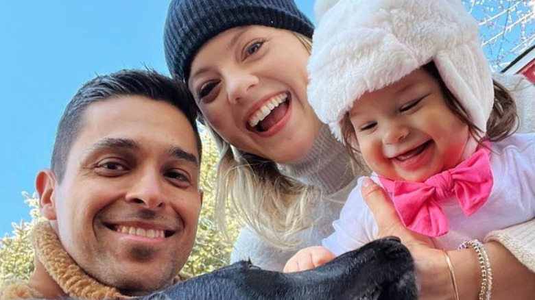 Wilmer Valderrama and Amanda Pacheco pose with their daughter, Nakano, for a fun selfie outdoors