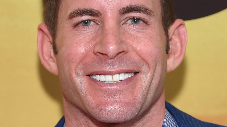 Tarek El Moussa smiles on the red carpet