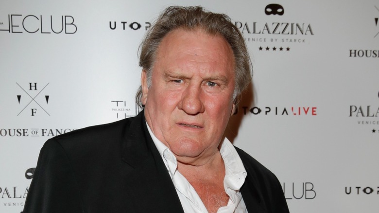 Gerard Depardieu posing at event