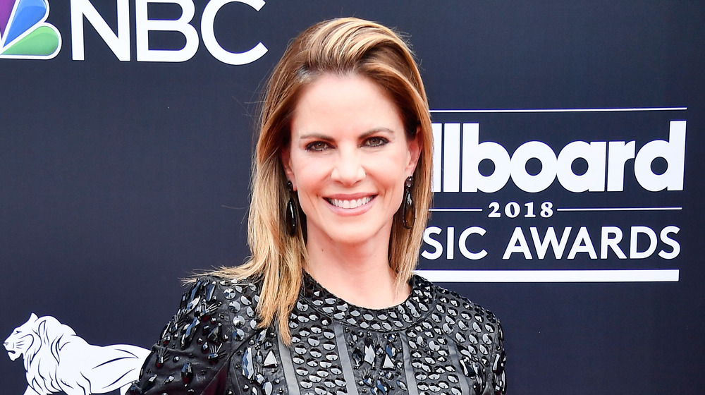 Natalie Morales smiling on the red carpet