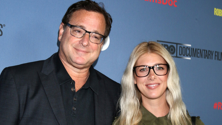 Bob Saget and Kelly Rizzo, both smiling
