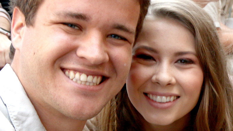 Chandler Powell and Bindi Irwin smiling