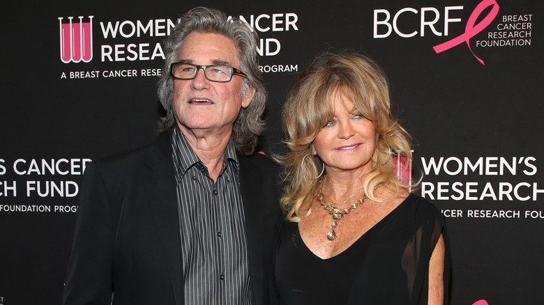 Goldie Hawn and Kurt Russell posing at The Women's Cancer Research Fund's An Unforgettable Evening Benefit Gala