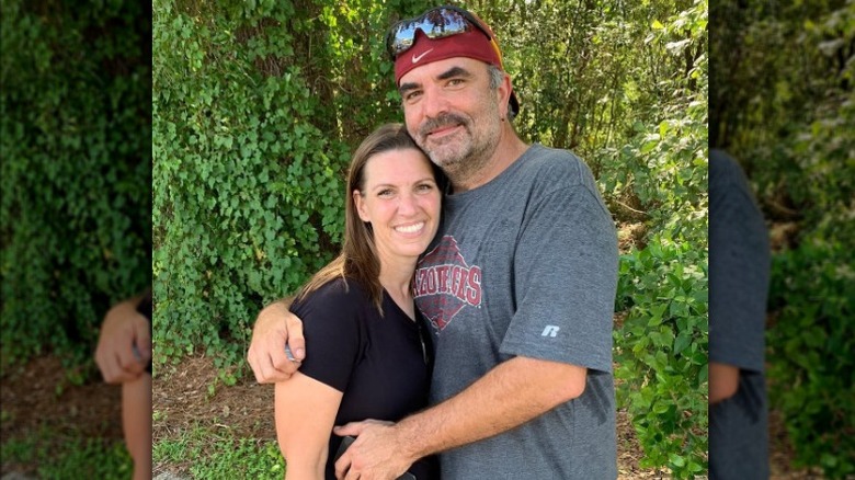 Amanda Brumfield poses with her husband Chris