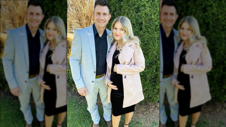 Chad Paine and Erin Bates posing together at a wedding.