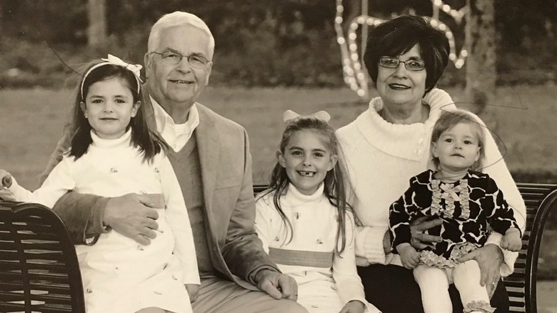 Christi Paul's parents pose with her daughters