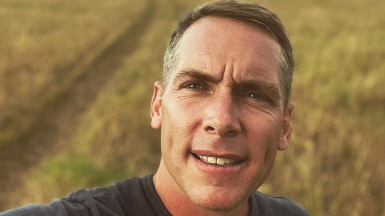 Clint Harp takes selfie against Montana landscape