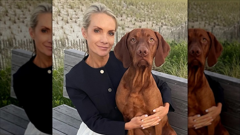 Dana Perino posing with her dog Percy