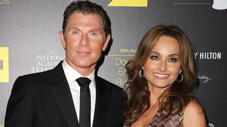 Giada De Laurentiis and Bobby Flay on a red carpet.