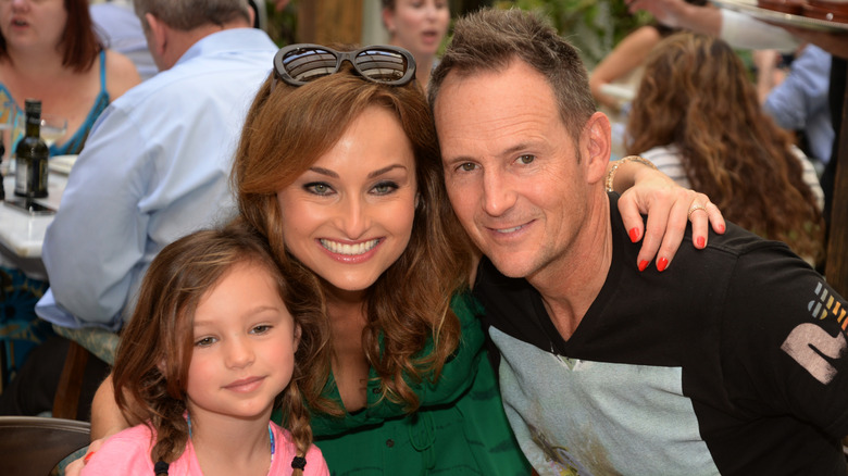 Todd Thompson and Giada De Laurentiis with their daughter in 2014