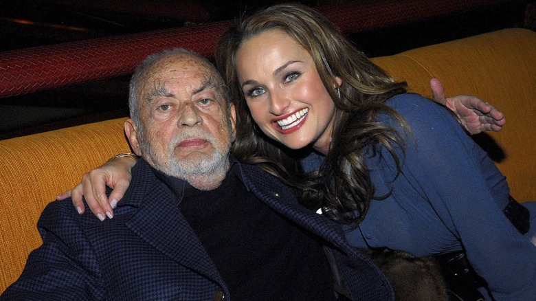 Dino De Laurentiis and Giada embrace at a Hollywood afterparty.
