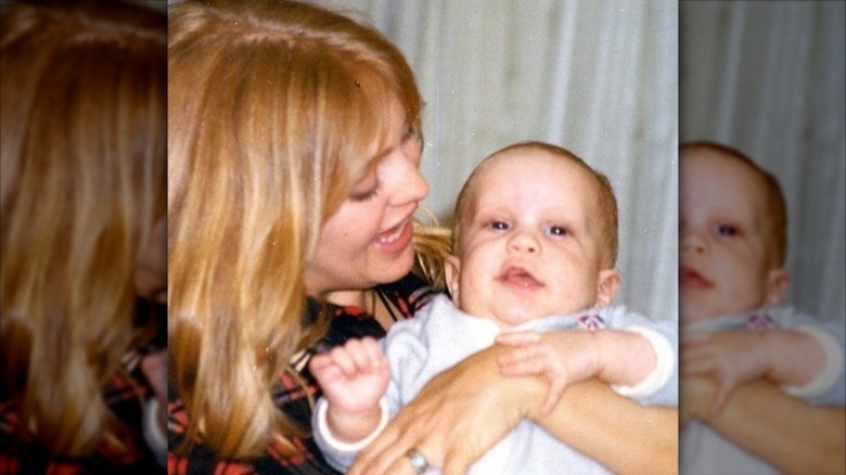 Goldie Hawn holds baby Oliver