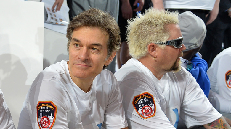 Dr. Oz and Guy Fieri wearing white Fire department uniforms
