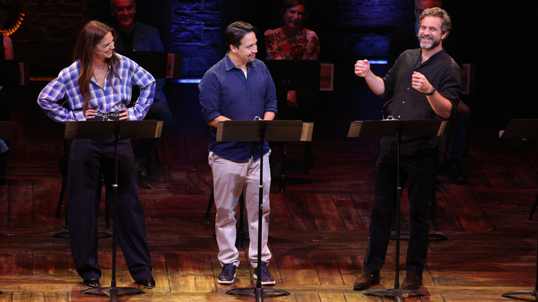 Joshua Jackson on stage with Katie Holmes and Lin-Manuel Miranda at the Dawson's Creek reunion.