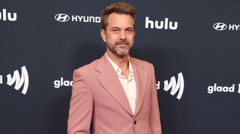 ﻿﻿Joshua Jackson posing on the red carpet at the 2025 GLAAD media awards.