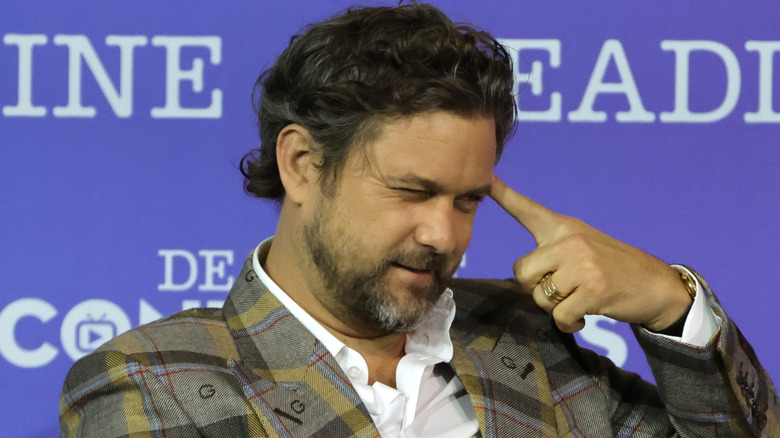 Joshua Jackson speaking animatedly in an interview.
