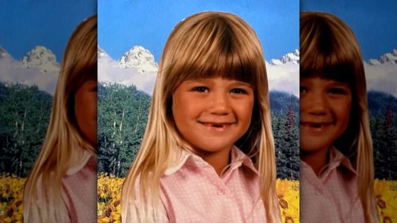 Kelly Clarkson smiles as a kid