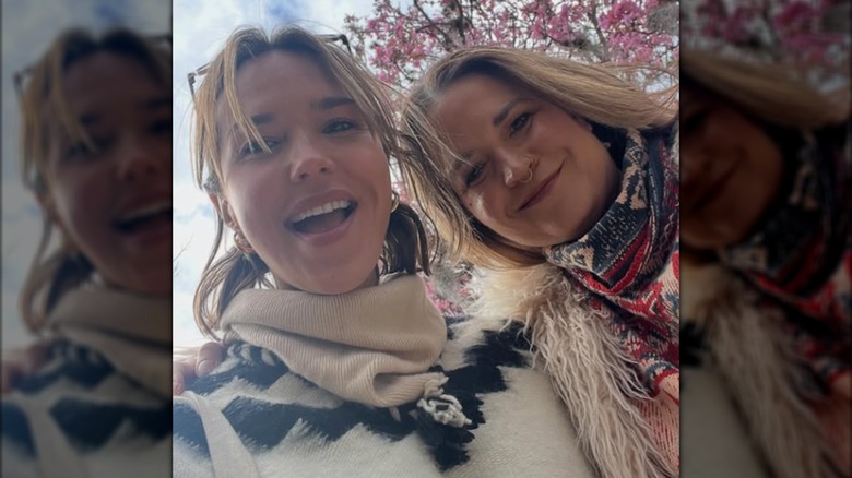 Arielle Kebbel and her sister Julia Kebbel pose together for a selfie.