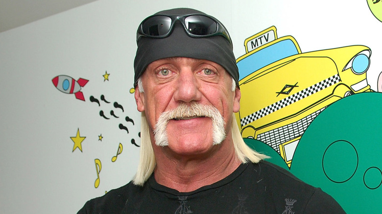 Hulk Hogan in front of an MTV banner