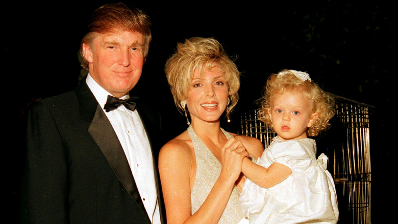 Donald Trump, Marla Maples, and Tiffany Trump posing