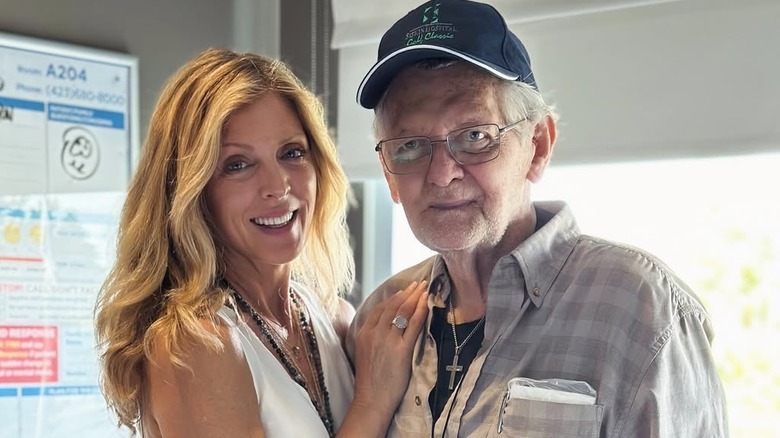 Marla and Stan Maples smiling and posing together