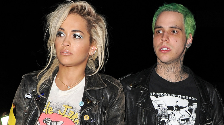 Rita Ora and Richard Hilfiger walking together