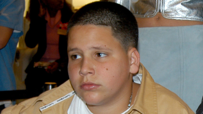 A young Richard Hilfiger with a buzzcut