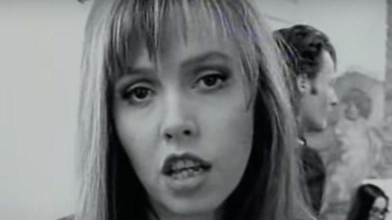 Anita Lane in a music video 