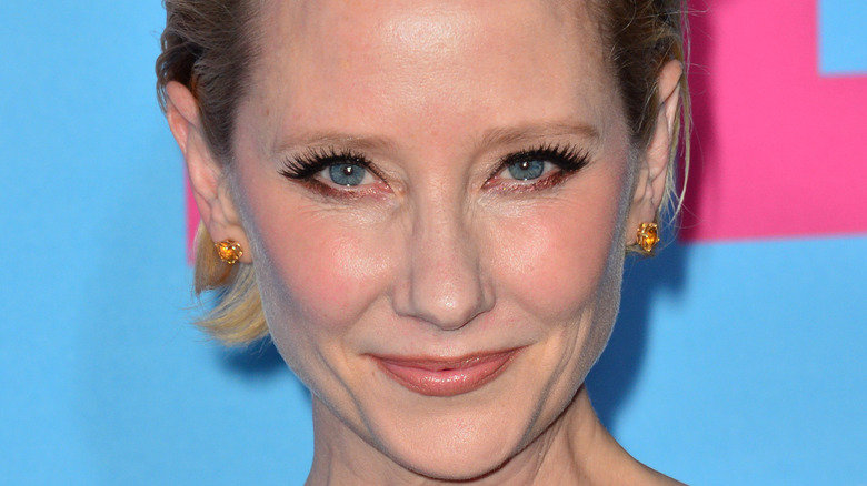 Anne Heche walks the red carpet with yellow diamond ear rings