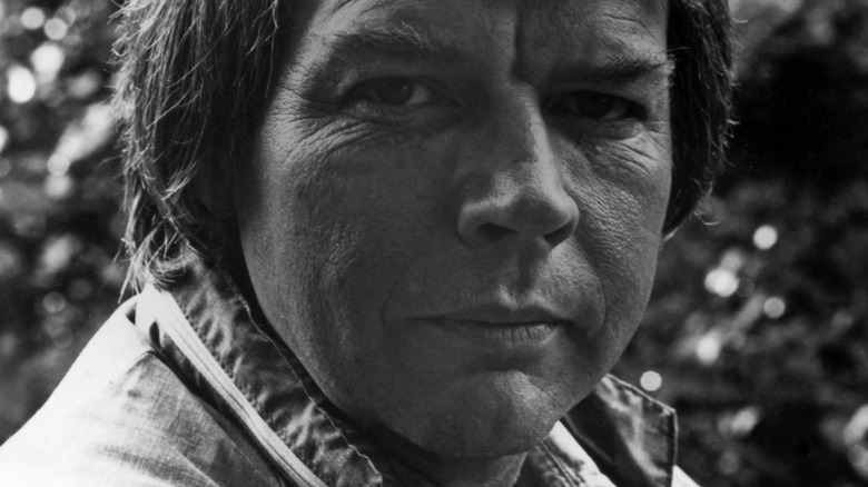 C.W. McCall looks at the camera in a black and white picture