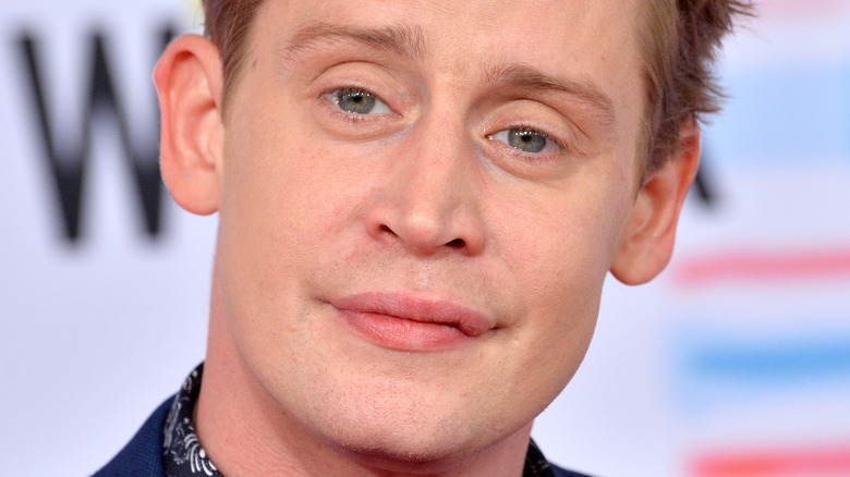 Macaulay Culkin poses on the red carpet