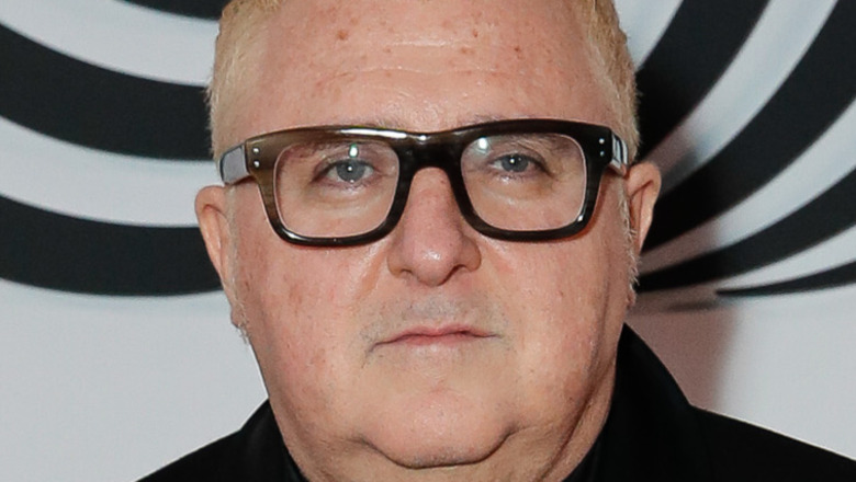designer Alber Elbaz on step and repeat