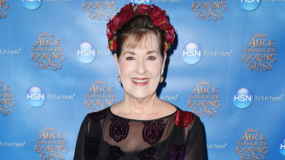 Kerry Vincent with flowers in her hair on the red carpet