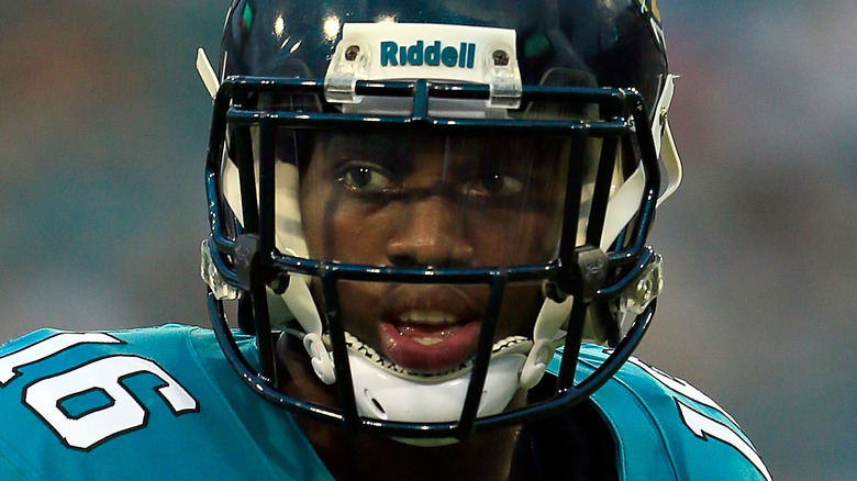 Antonio Dennard playing football helmet